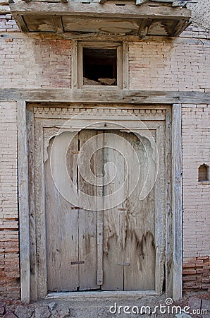 Ancient wooden door at derawar fort pakistan Stock Photo
