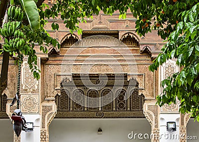 An ancient wooden frame with decorative details inside Marrakech Bahia Palace Editorial Stock Photo