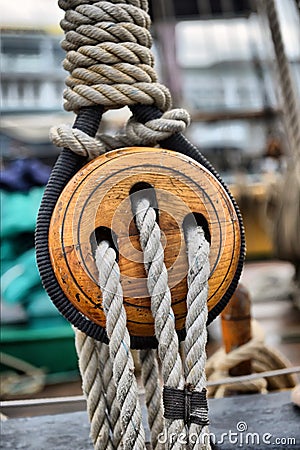 Ancient wooden sailboat pulleys Stock Photo