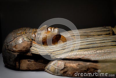 Ancient wooden sculpture of an Egyptian woman Editorial Stock Photo