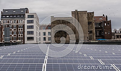 Anderlecht, Brussels Capital Region - Belgium - View over the rooftops, solar panels and the abattoir market taken from the Editorial Stock Photo