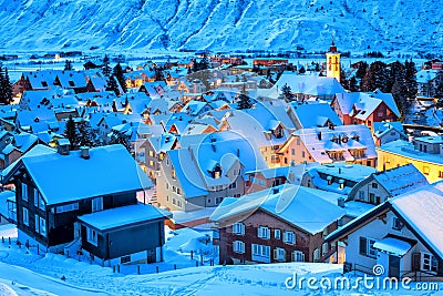 Andermatt village in the Alps mountains, snow covered in winter, Uri, Switzerland Stock Photo