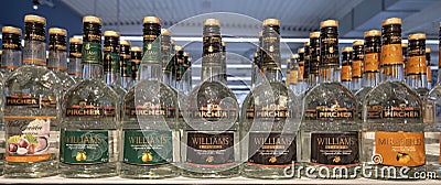 Andernach Germany 04.01.2020 Closeup bottles with logo lettering of pircher fruit brandy in shelf of german supermarket Editorial Stock Photo