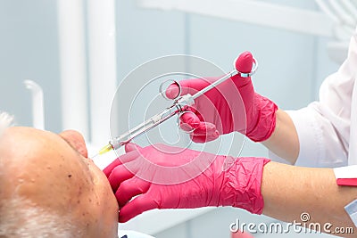 Anesthesia syringe closeup dentist. Stock Photo