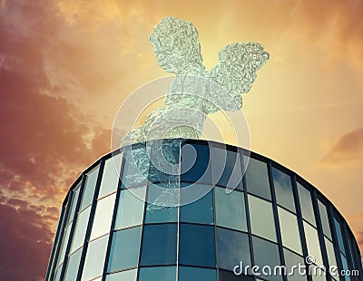 Angel on business against blue sky Stock Photo