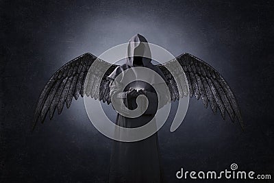 Angel of death with soul in hands Stock Photo