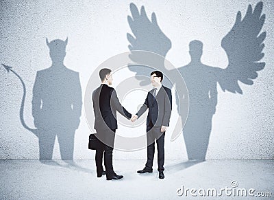 Angel and demon partners Stock Photo