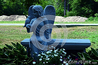 Angel and Dove Statue Stock Photo