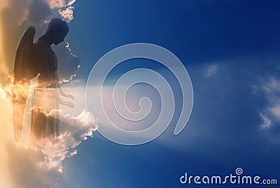 Angel in heaven over beautiful sunset Stock Photo