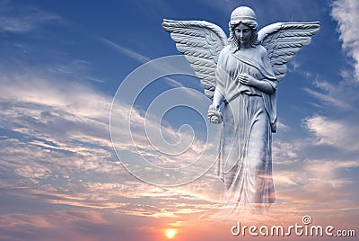 Angel in heaven over beautiful sunset Stock Photo