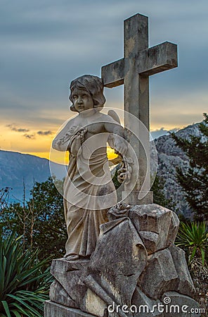 Angel with the Holy Cross Stock Photo