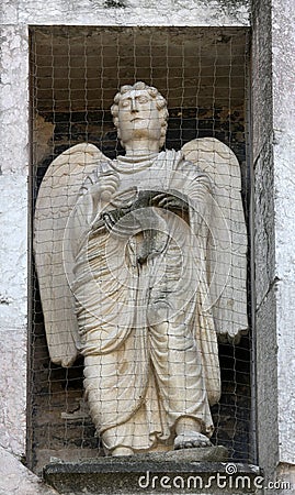 Angel, marble statue on the Baptistery, Parma, Italy Stock Photo