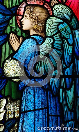 Angel (praying) in stained glass Stock Photo