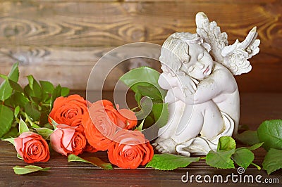 Angel and roses Stock Photo