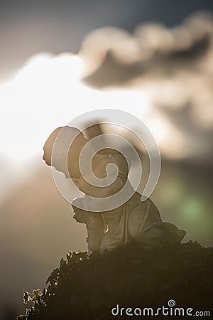 Marmoreal white Angel at the cemetery Stock Photo