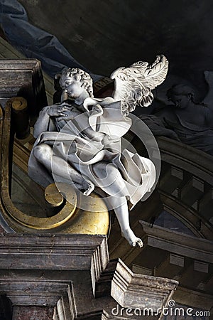 Angel statue on the main altar in the St John the Baptist church in Zagreb, Croatia Editorial Stock Photo