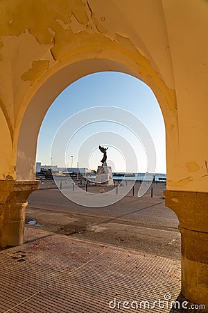 Angel Statue of Victory at sunset framed in an arch Editorial Stock Photo