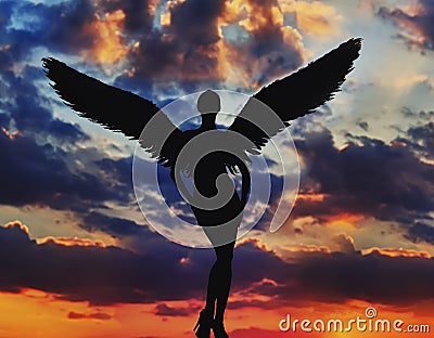 angel with wings in the amazing sky Stock Photo