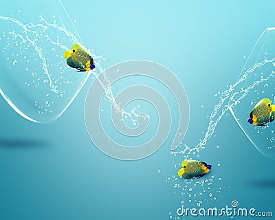 Angelfish jumping out of fishbowl Stock Photo