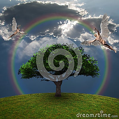 Angels above green tree Stock Photo
