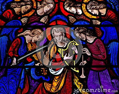 Angels making music in stained glass Stock Photo