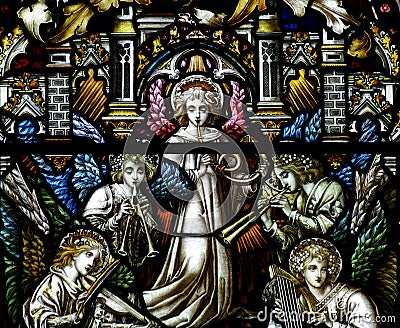 Angels making music in stained glass Stock Photo