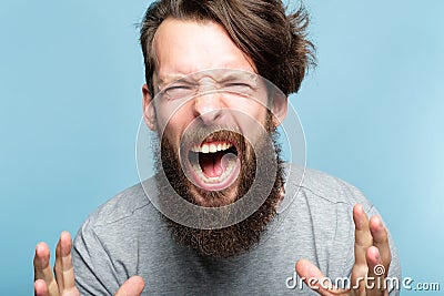 Anger fury emotional breakdown enraged man scream Stock Photo