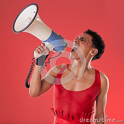 Anger, gay and a man with a megaphone for protest isolated on a red background in a studio. Lgbt, freedom and person Stock Photo