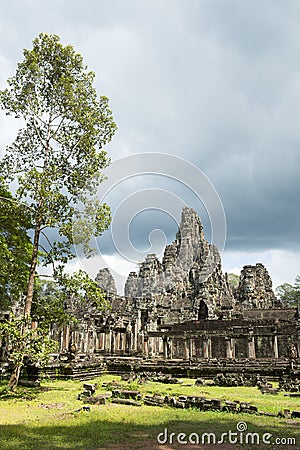 Angkor Temple of Bayon with Greenery Stock Photo