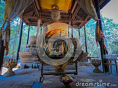 Tep Pranam giant stone Buddha statue in Angkor Thom temple, Cambodia. Editorial Stock Photo