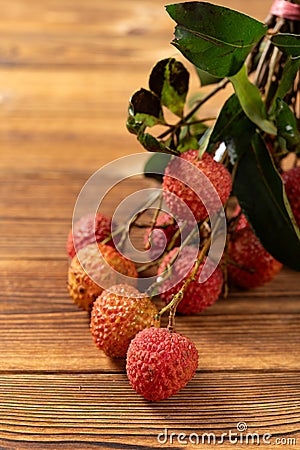 bunch of fresh lichees at vertical composition Stock Photo