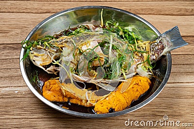 home cooked fresh steamed whole fish Stock Photo
