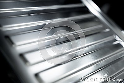 Angle view of rows metal kitchen sink at the showroom of a large store. Stock Photo