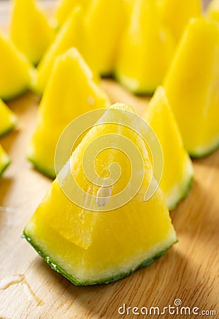 small slices yellow color fresh watermelon at vertical composition Stock Photo