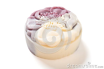 trendy and beautiful flower shape purple and white colors moon cake on a white background Stock Photo