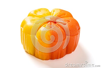 trendy and beautiful flower shape yellow and orange colors moon cake on a white background Stock Photo