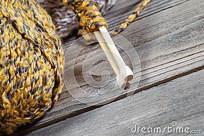 Angled closeup of bottom part of wooden Knitting needles Stock Photo