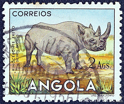 ANGOLA - CIRCA 1953: A stamp printed in Angola shows a Black Rhinoceros, circa 1953. Editorial Stock Photo