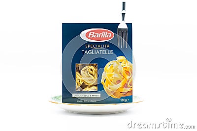 Angri, Italy. September 2th, 2020. Pack of Italian tagliatelle pasta noodles in cardboard package with fork, placed in a plate, Editorial Stock Photo