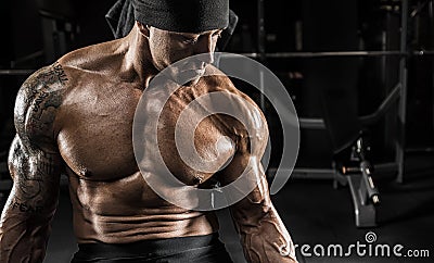 Angry athlete trains in the gym Stock Photo