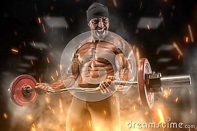 Angry athlete trains in the gym Stock Photo
