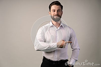 Angry boss dismissing frustrated upset male subordinate, dissatisfied employer telling employee to get out pointing with finger, Stock Photo