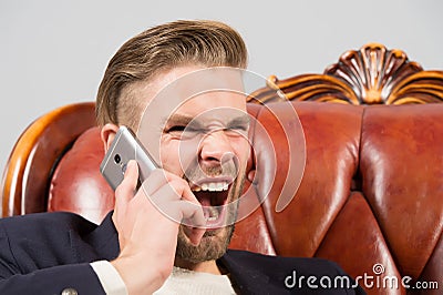 Angry boss. Man well groomed shout aggressively mobile phone grey background. Businessman angry call mobile phone Stock Photo