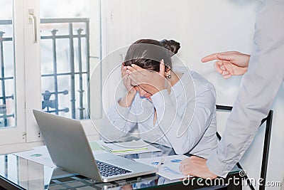 Angry boss and stressed employee in the office Stock Photo