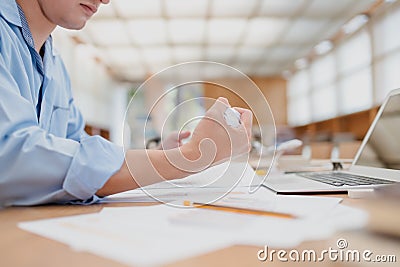 Angry business people crumple business data documents. Business fail, serious or angry concept Stock Photo