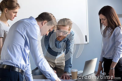 Angry businessman disagree with colleague over document mistake Stock Photo