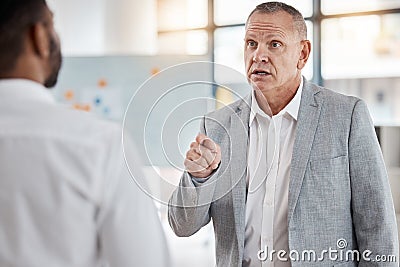 Angry businessman, finger pointing or argument or fight at workplace after misunderstanding. Leader, ceo or boss unhappy Stock Photo