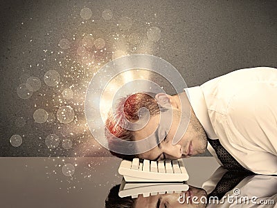 Angry businessman with lights and keyboard Stock Photo