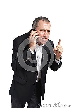 Angry Businessman talking on the phone Stock Photo