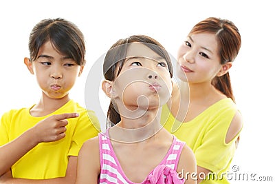 Angry children with mother Stock Photo